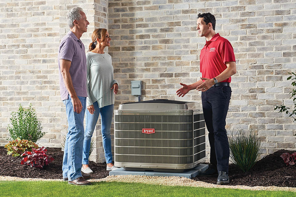products-Bryant-HeatPump-960×640 HVAC technician talking with customers